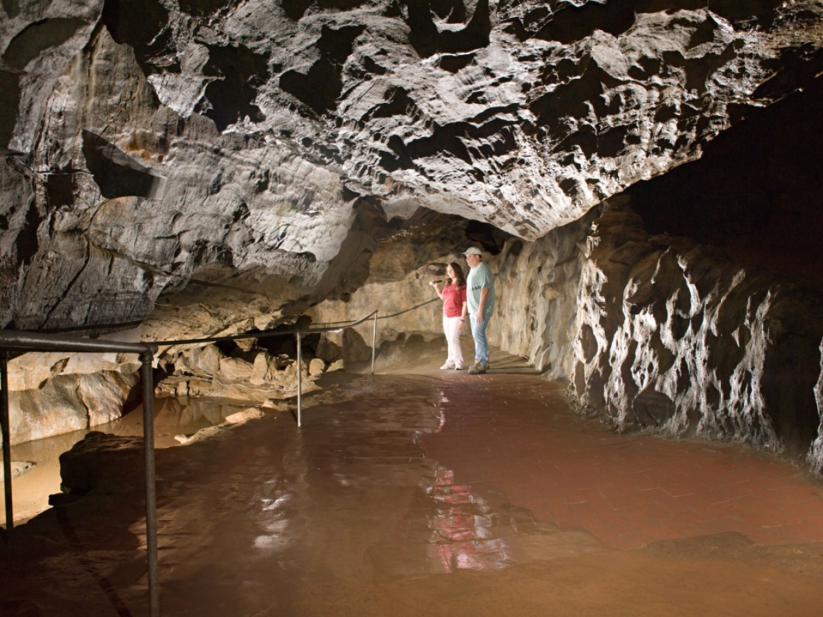 a group of people on a rock