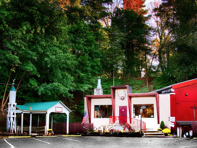 a bus parked in front of a house